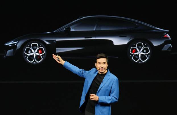Chinese tech giant Xiaomi unveils new generation of SU7 electric vehicle, in Beijing