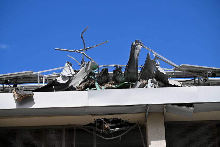 Aftermath of an Iranian missile strike, in Holon