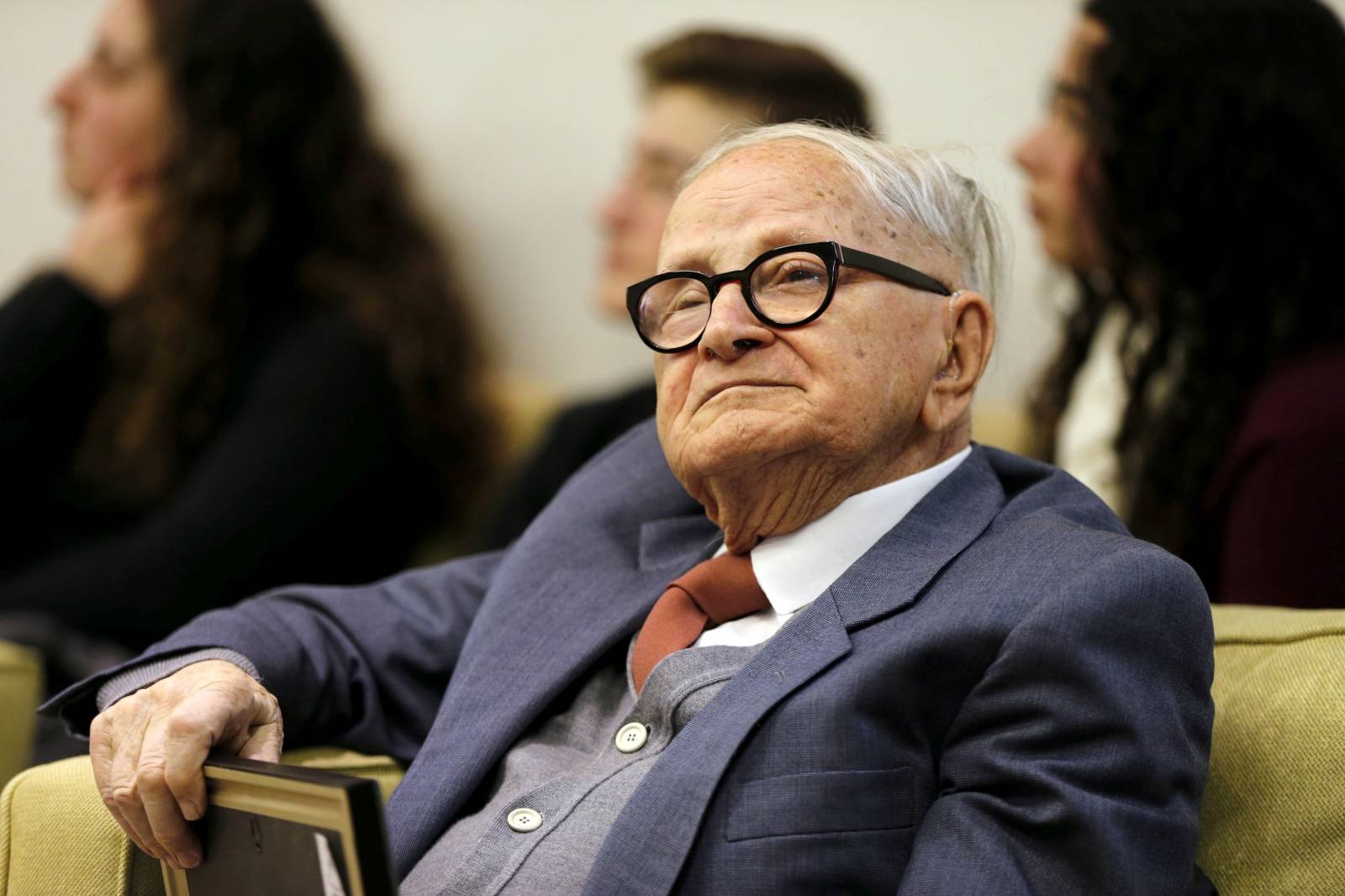 FILE PHOTO: Eitan, who was involved in the capture of Eichmann, an architect of the Nazi Holocaust, sits during a ceremony at Israeli President Rivlin's residence in Jerusalem