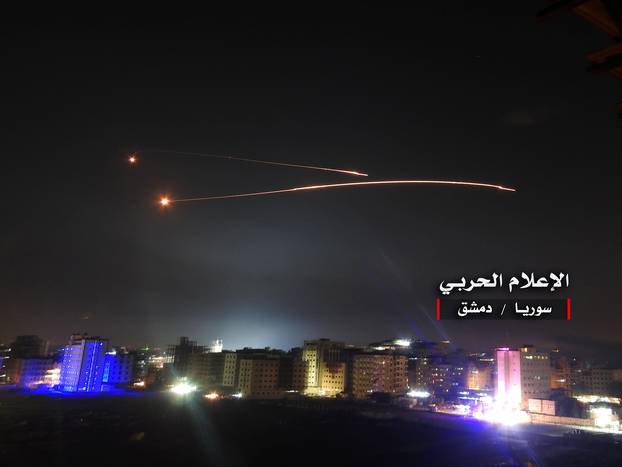 Missiles fire is seen over Damascus