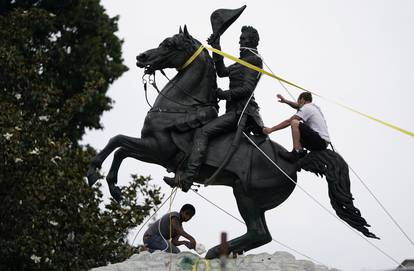 Protestors try to pull down statue of U.S. President Andrew Jackson in front of the White House in an attempt to pull it down  in Washington