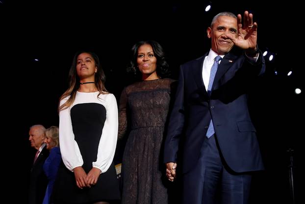 U.S. President Barack Obama is joined onstage by first lady Michelle Obama, Vice President Joe Biden and his wife Jill Biden, after his farewell address in Chicago