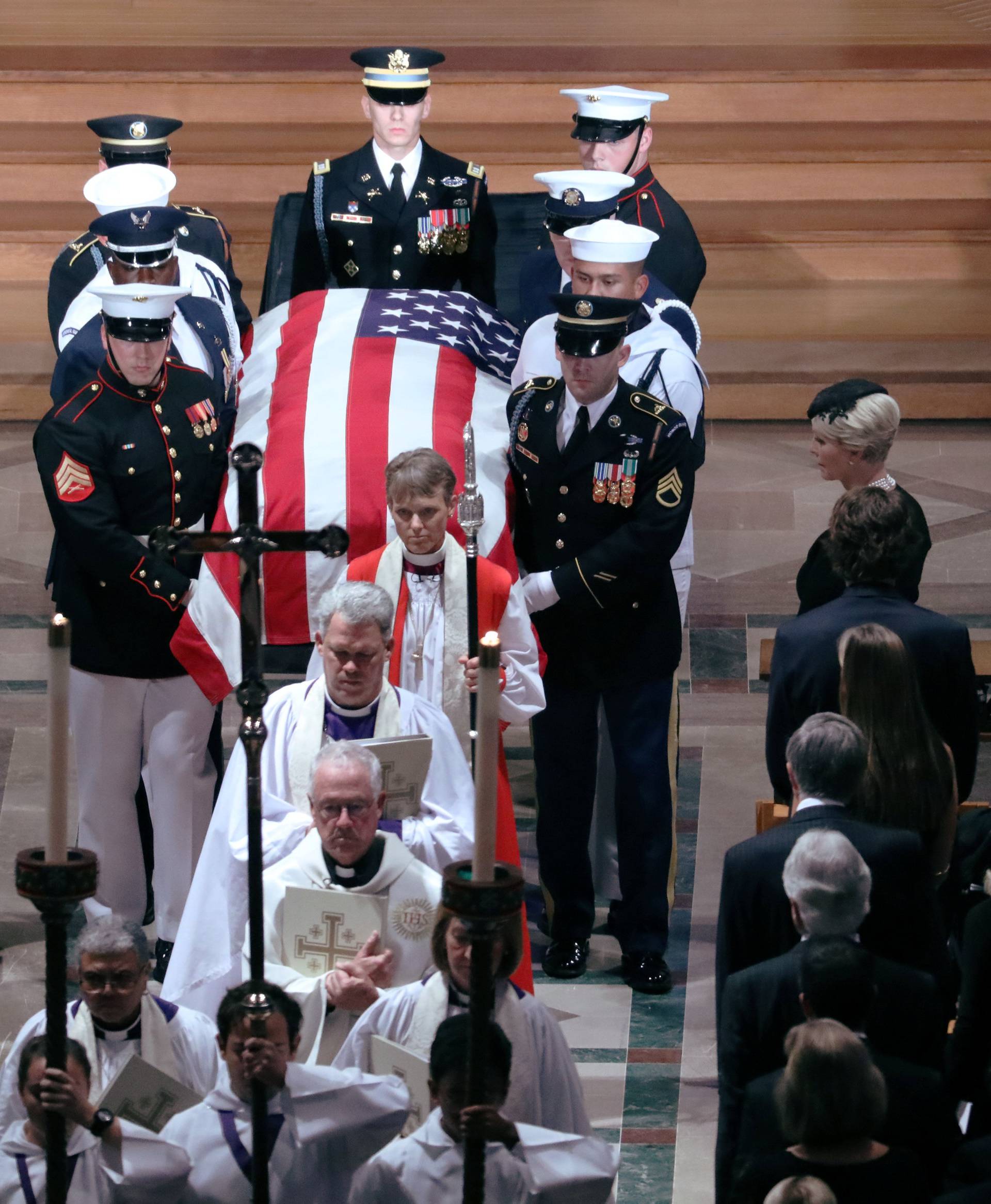 The casket is pictured leaving the memorial service of U.S. Senator John McCain at National Cathedral in Washington