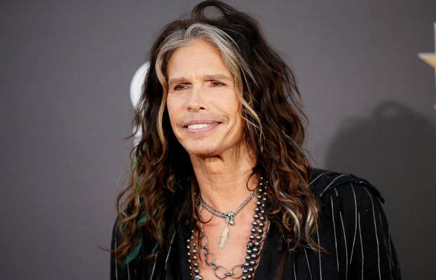 FILE PHOTO: Singer Steven Tyler of Aerosmith arrives at the Hollywood Film Awards in Hollywood