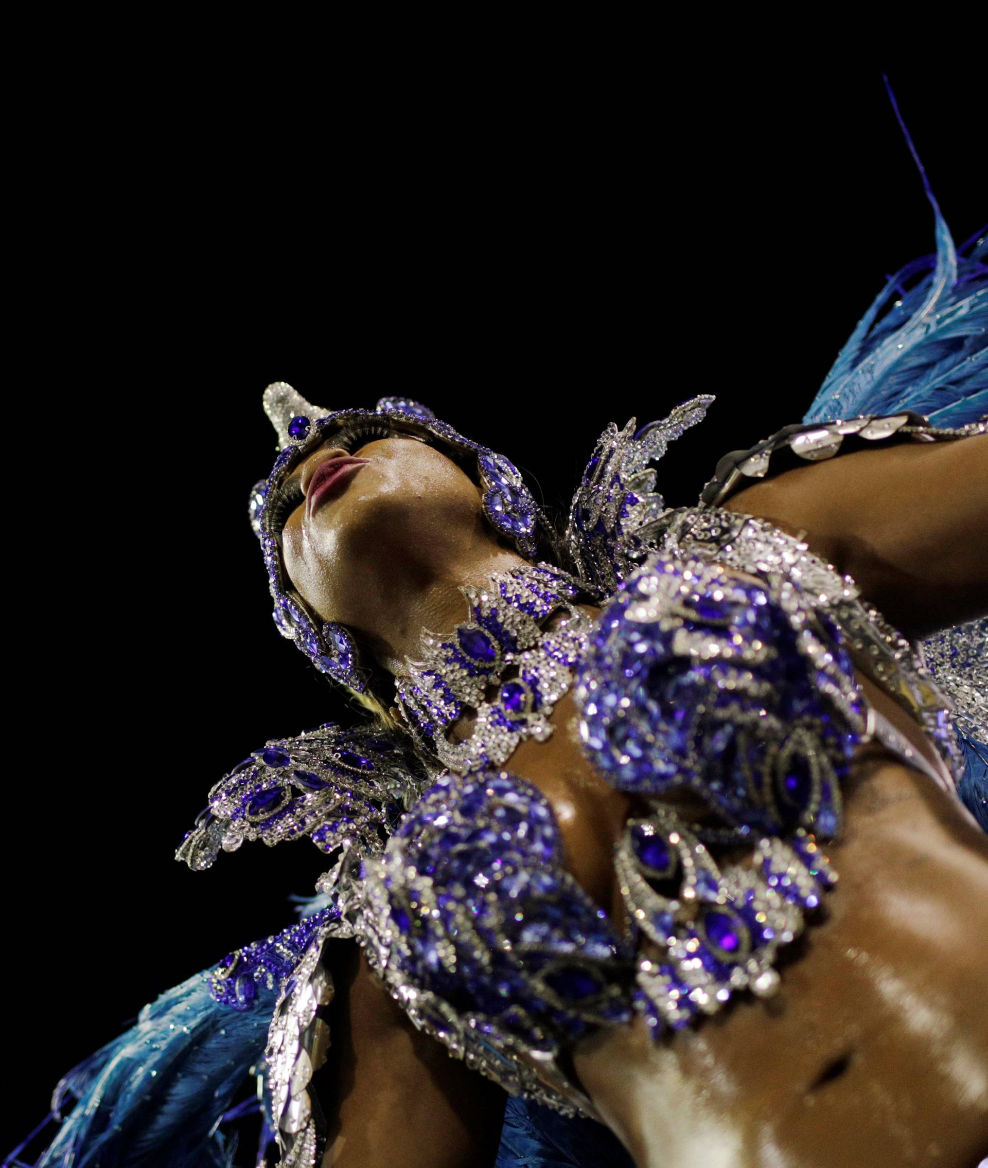 Drum queen Bianca Monteiro from Portela Samba school performs during the second night of the Carnival parade at the Sambadrome in Rio de Janeiro
