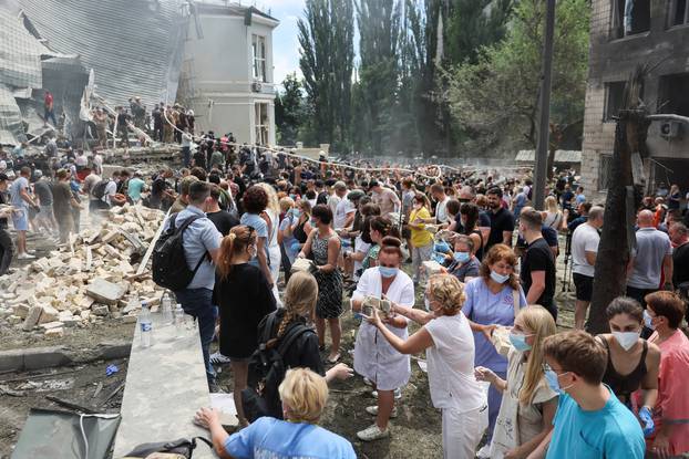 Rescuers work at Ohmatdyt Children's Hospital that was damaged during Russian missile strikes, in Kyiv