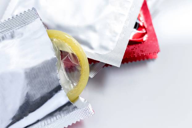 stack condoms isolated on white background.
