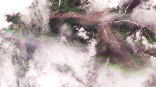 Satellite images show torrent of rock and ice high in Nepalese mountain valley after Nepal-China disaster