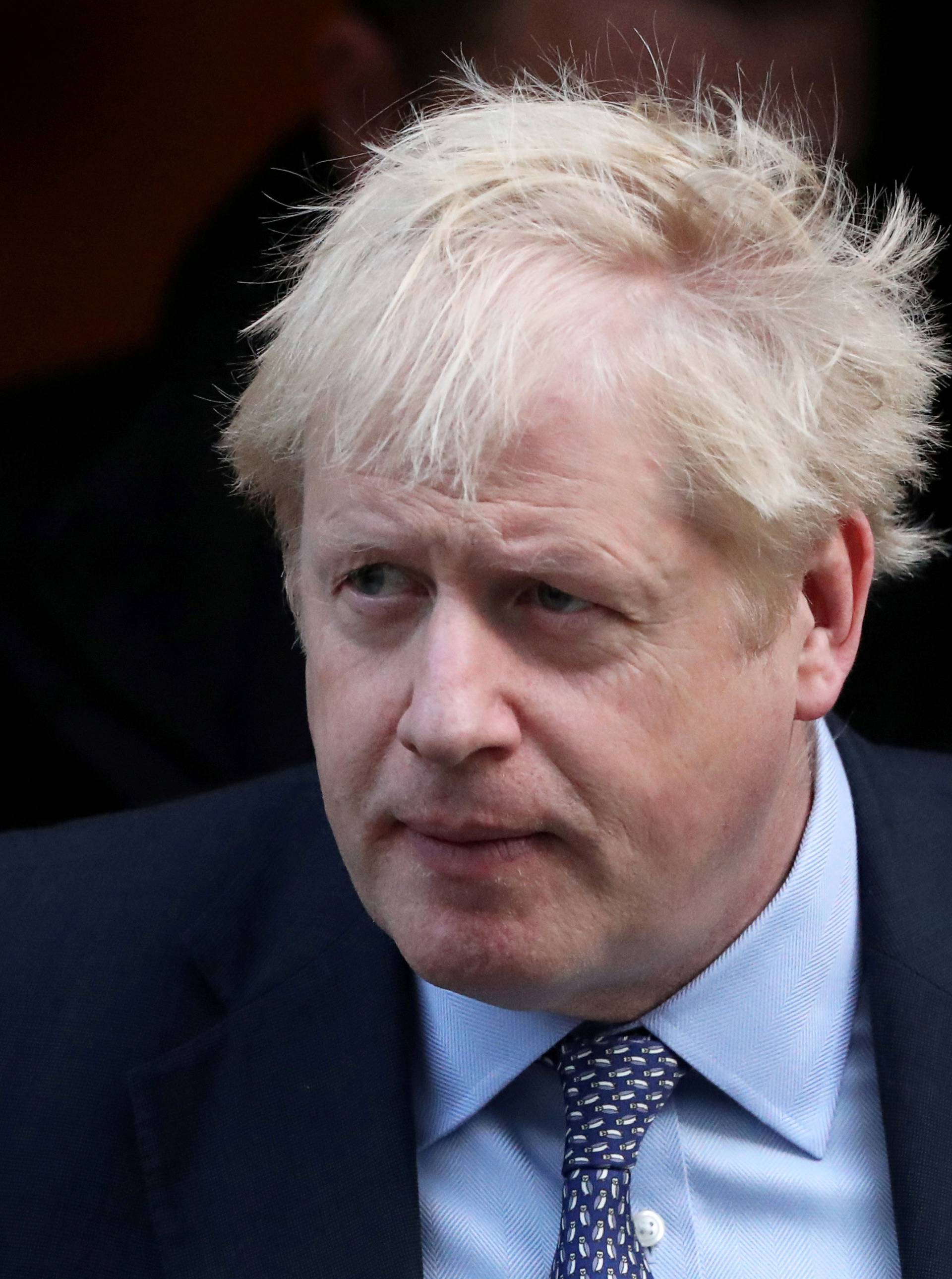 FILE PHOTO: Britain's Prime Minister Boris Johnson leaves Downing Street to head for the House of Commons as parliament discusses Brexit, sitting on a Saturday for the first time since the 1982 Falklands War, in London