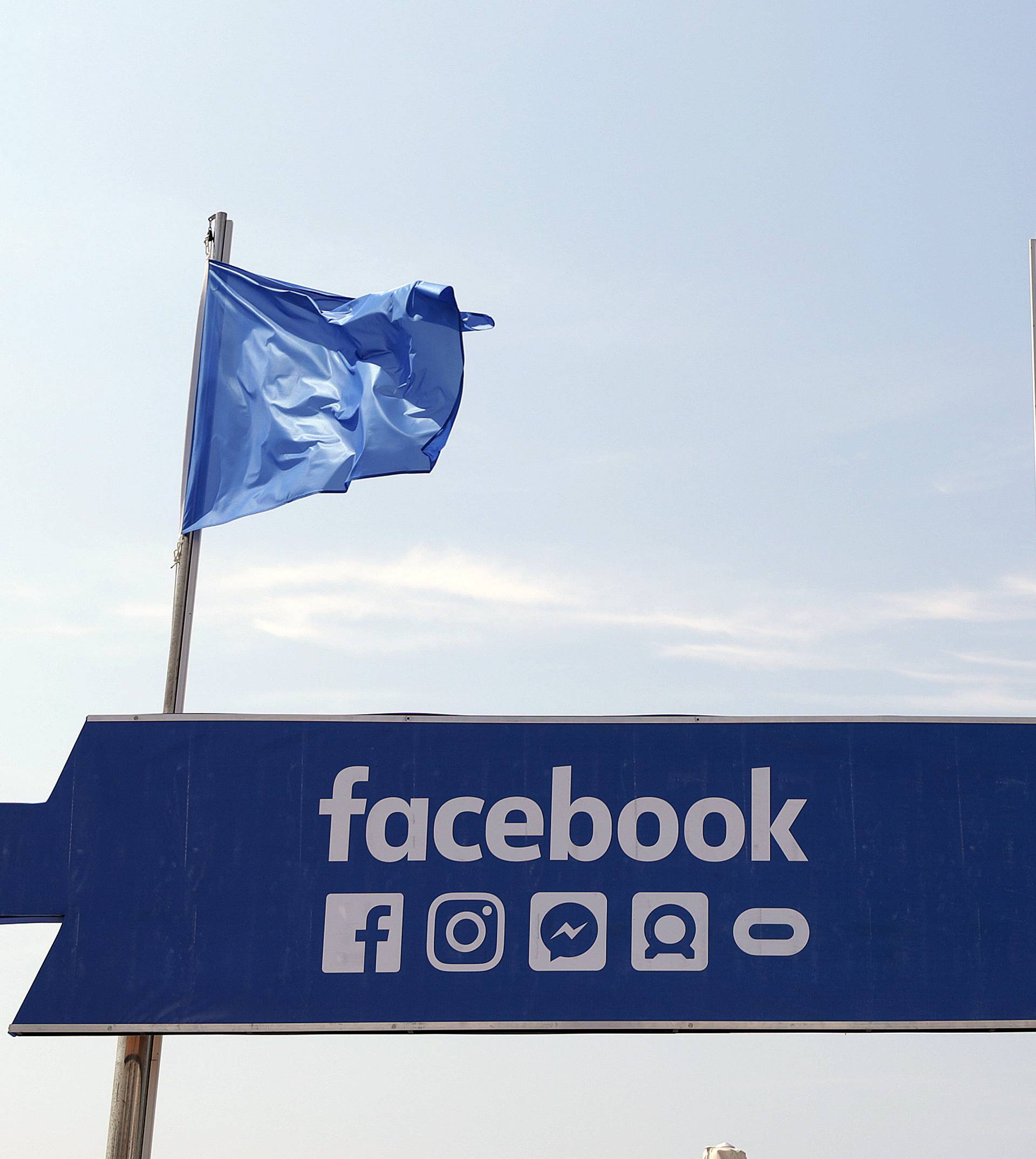 The logo of the social network Facebook is seen on a beach during the Cannes Lions Festival in Cannes