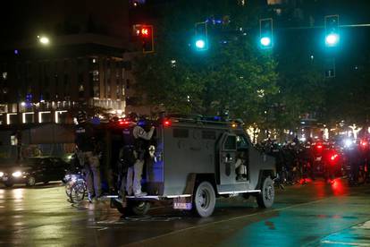 Police officers respond to a protest march that took place on Election Day in Seattle