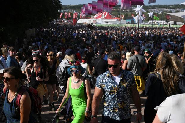 Revellers attend Glastonbury Festival at Worthy Farm in Pilton, Somerset, Britain