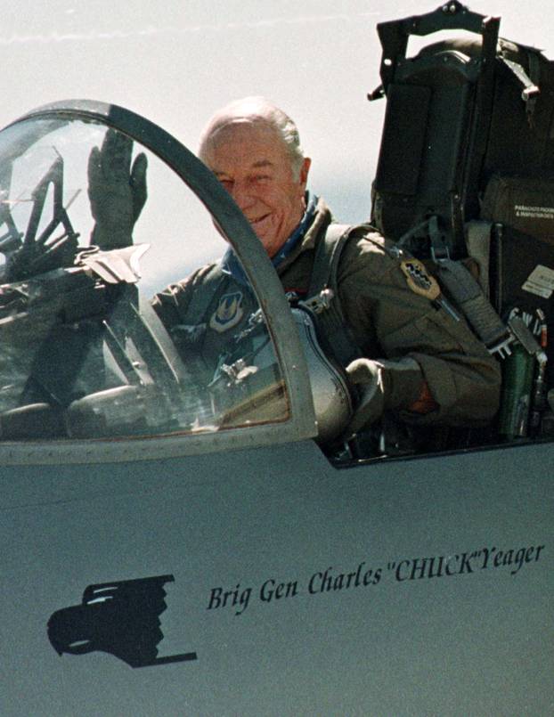 FILE PHOTO: Retired Air Force General Chuck Yeager waves to the crowd at Edwards Air Force Base, California
