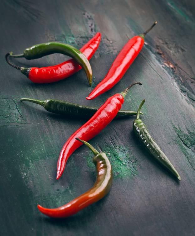 Chilli pepper on the colorfull background with Copyspace