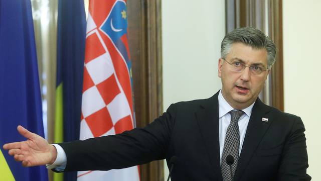 Ukrainian President Volodymyr Zelenskiy and Croatian Prime Minister Andrej Plenkovic deliver a joint statement in Kyiv