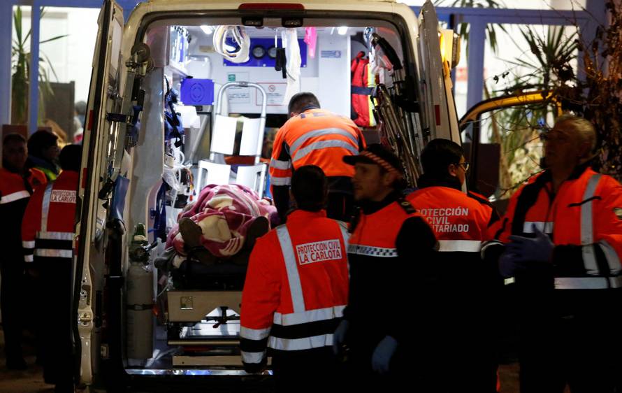 People affected by a deadly train derailment are transferred and treated at the Caseta Municipal in the town of Adamuz