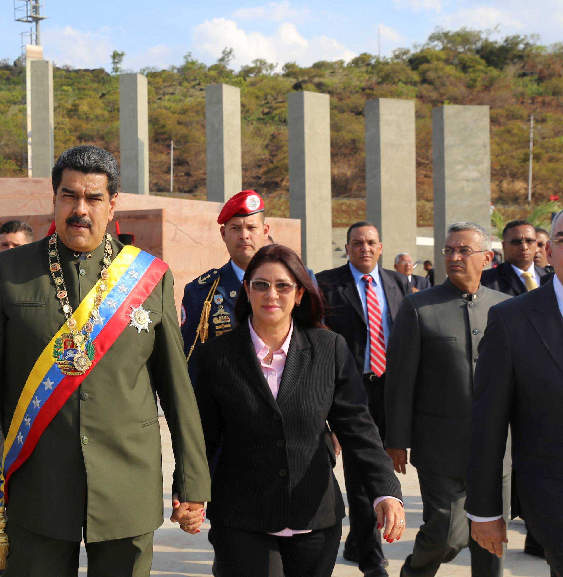 Venezuela's President Nicolas Maduro arrives to an event to conmemorate the bicentennial of the Battle of San Felix, next to his wife Cilia Flores, in San Felix