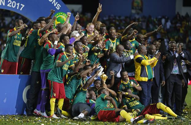 Cameroon celebrate with the trophy after winning the African Cup of Nations