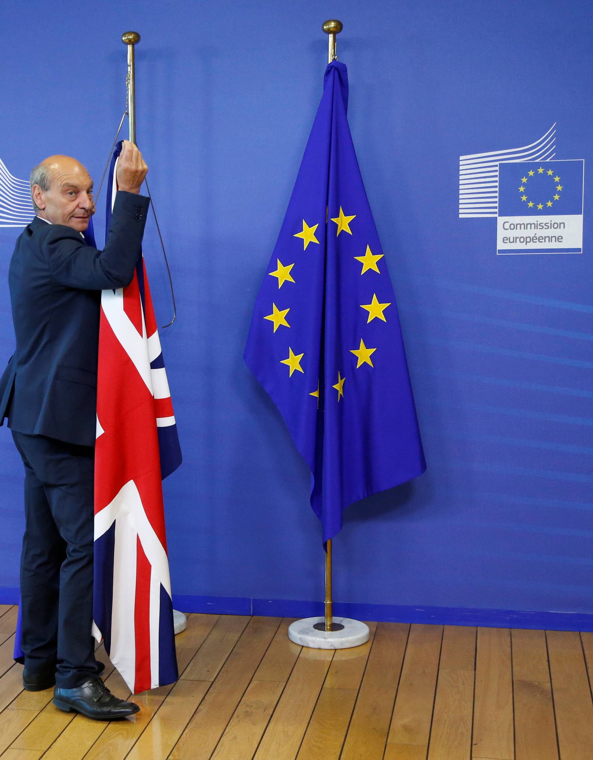 Flags are arranged at the EU headquarters as Britain and EU launch Brexit talks in Brussels