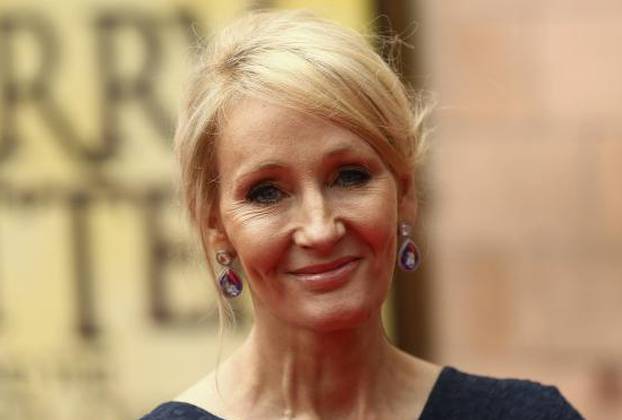 Author J.K. Rowling poses for photographers at a gala performance of the play Harry Potter and the Cursed Child parts One and Two in London