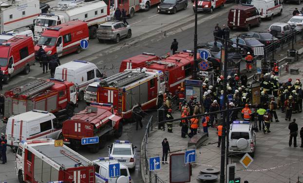 General view of emergency services attending the scene outside Sennaya Ploshchad metro station, following explosions in two train carriages in St. Petersburg