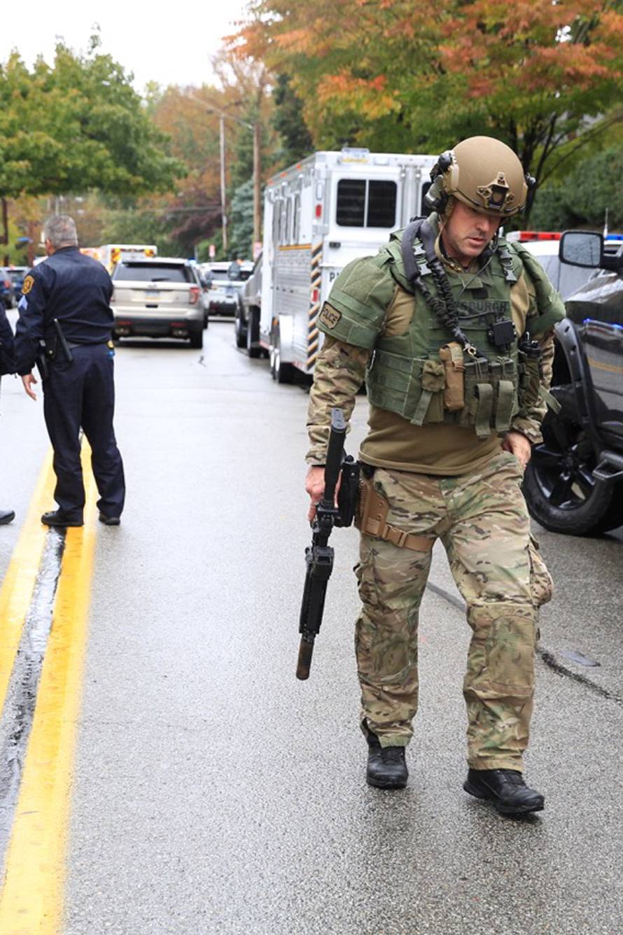 Police officers respond after a gunman opened fire at the Tree of Life synagogue in Pittsburgh Pennsylvania
