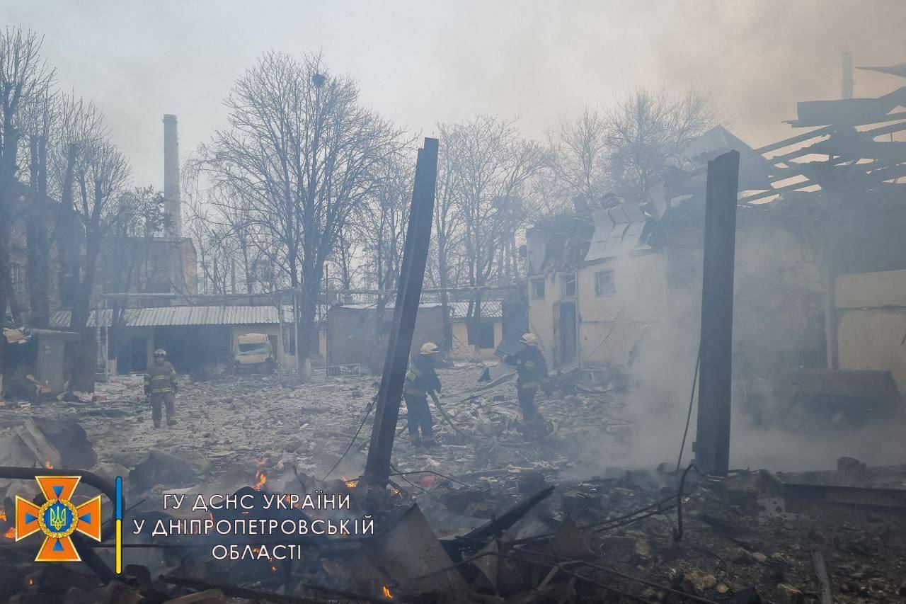 Rescuers work among remains of buildings damaged by airstrike in Dnipro