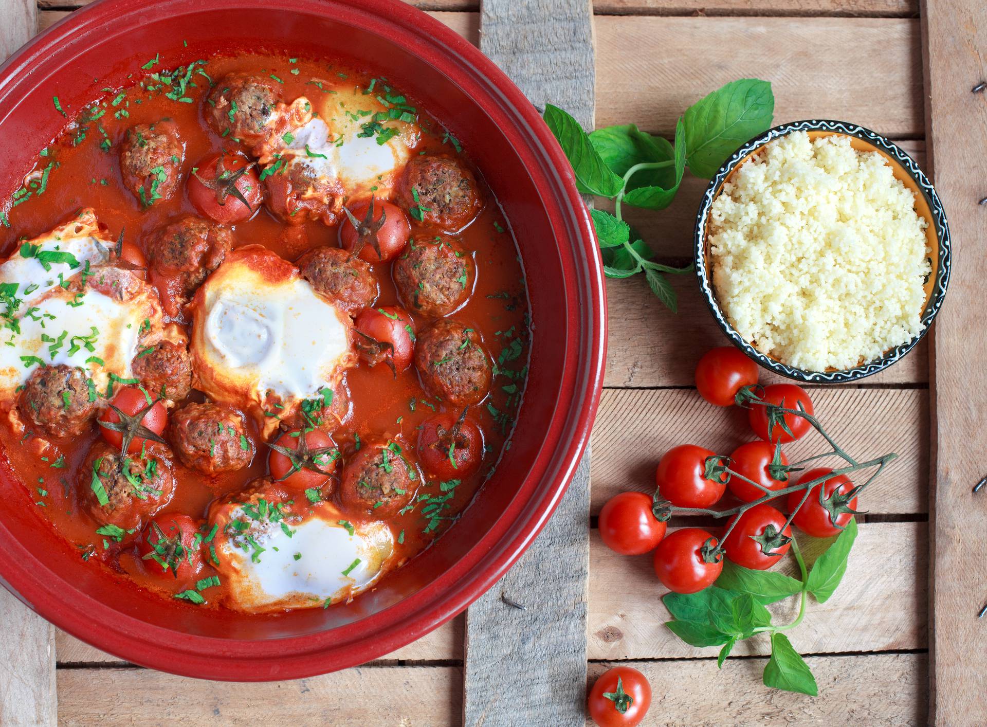 Moroccan tagine of lamb with kefta (meatballs), tomatoes and eggs