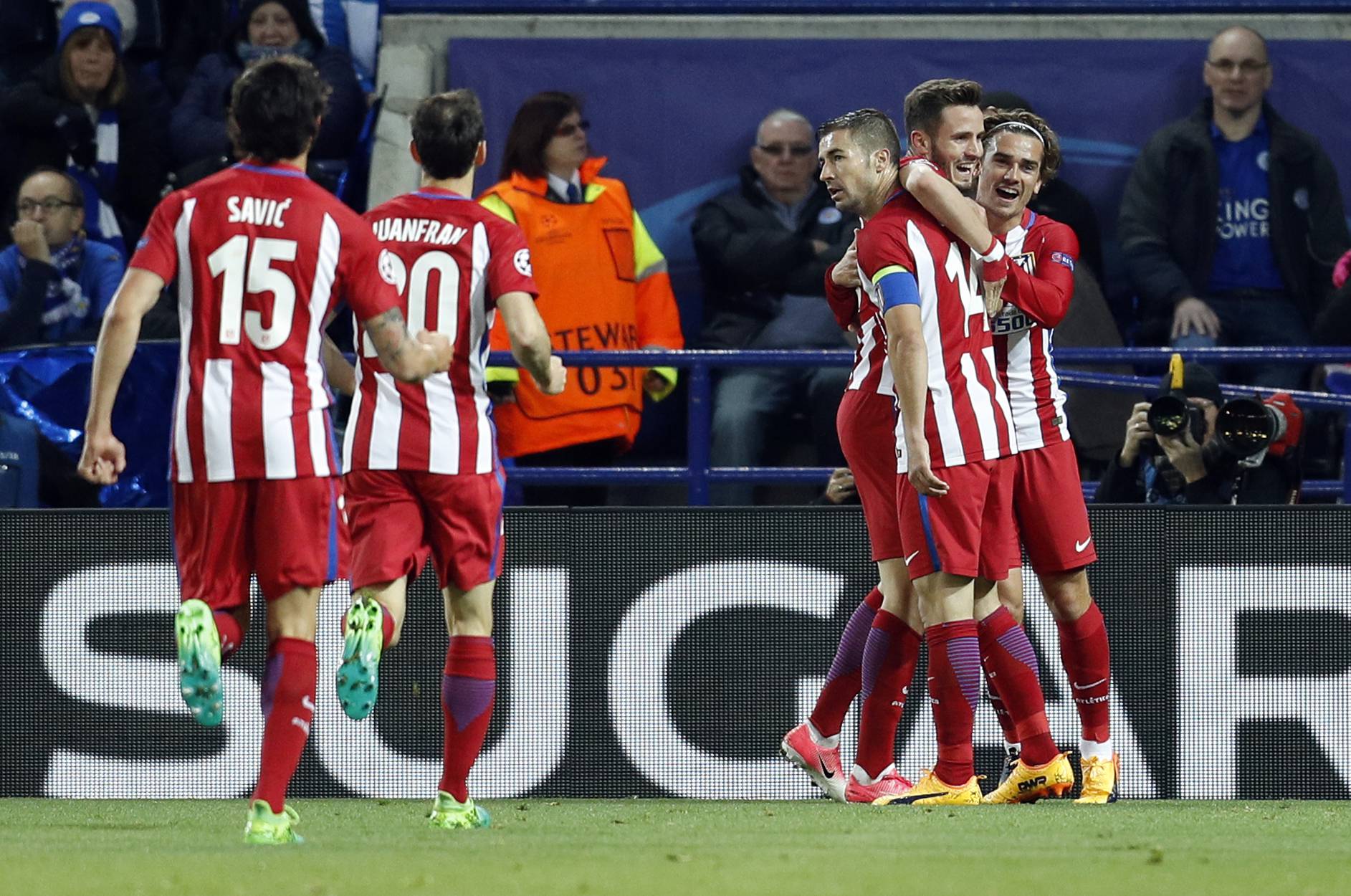 Atletico Madrid's Saul Niguez celebrates scoring their first goal with team mates