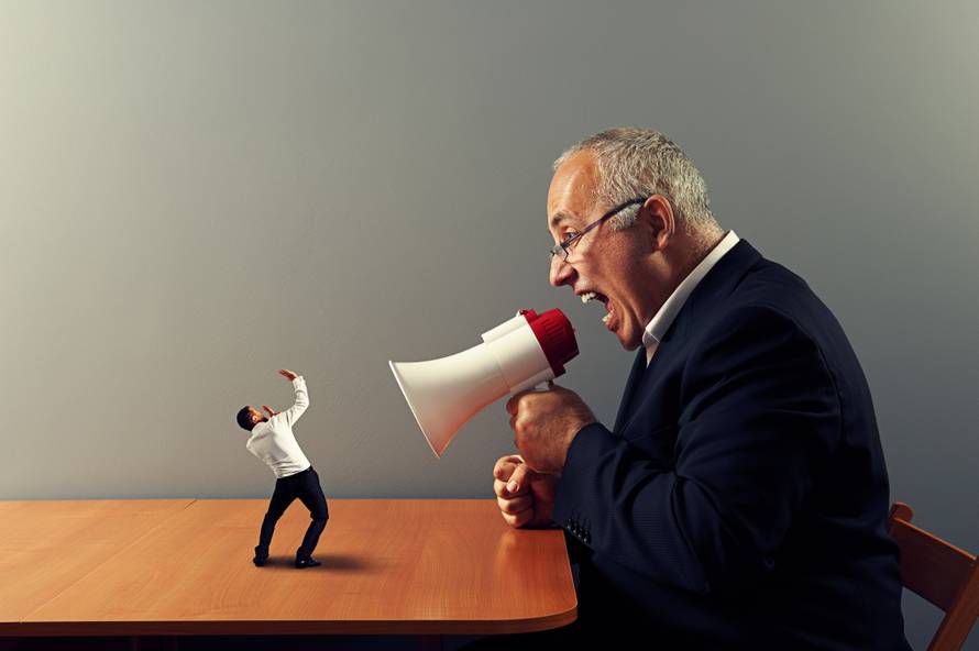 boss screaming at small businessman