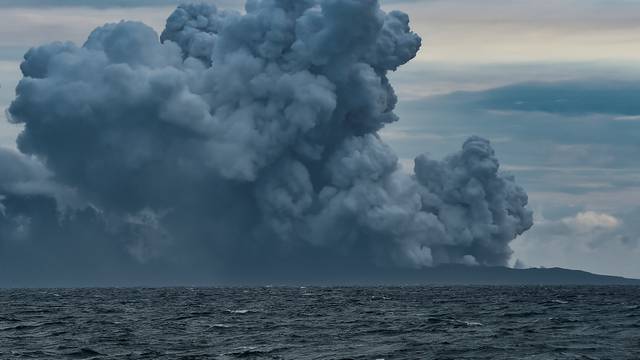 Mount Anak Krakatau volcano spews hot ash during an eruption as seen from Indonesian Naval Patrol Boat, KRI Torani 860, at Sunda strait in Banten