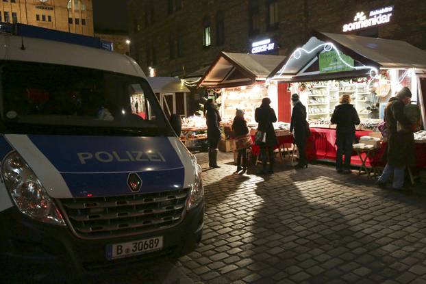 German police guards a Christmas market in the Prenzlauer Berg district in Berlin