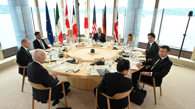 FILE PHOTO: G7 leaders attend a meeting at G7 leaders' summit in Hiroshima, Japan
