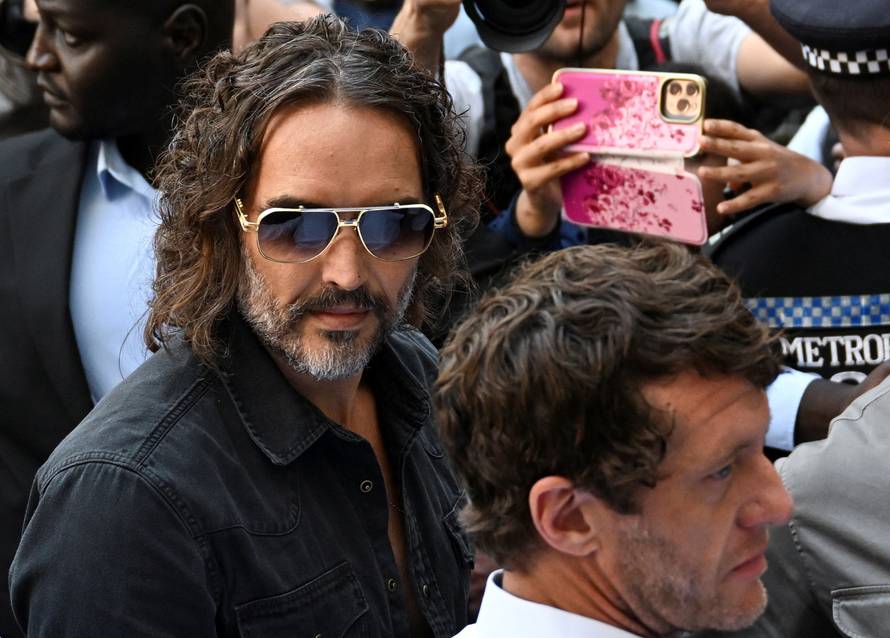 British actor and comedian Russell Brand appears at Westminster Magistrates' Court, in London
