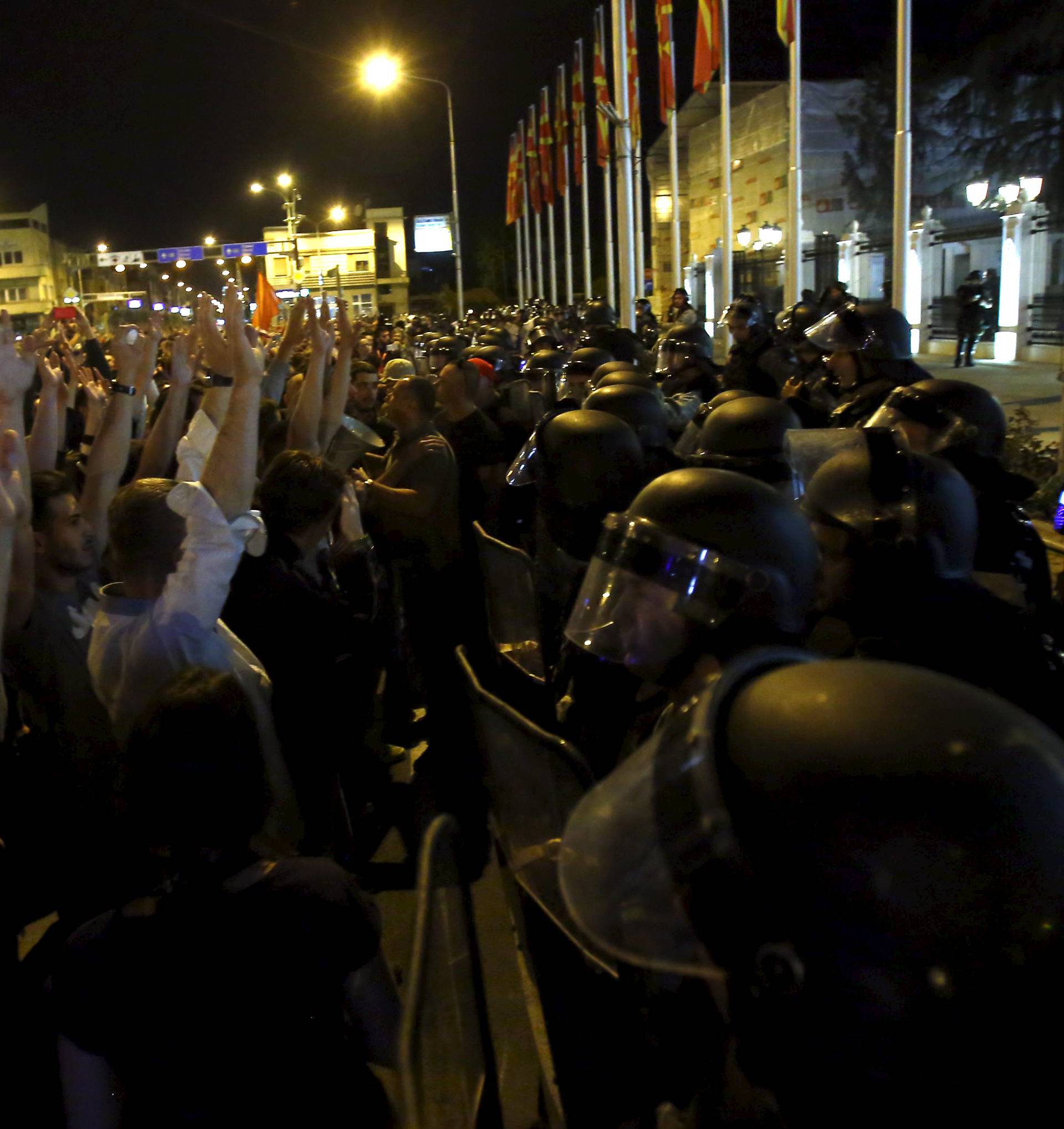 Protesters shout slogans against Macedonian government in Skopje