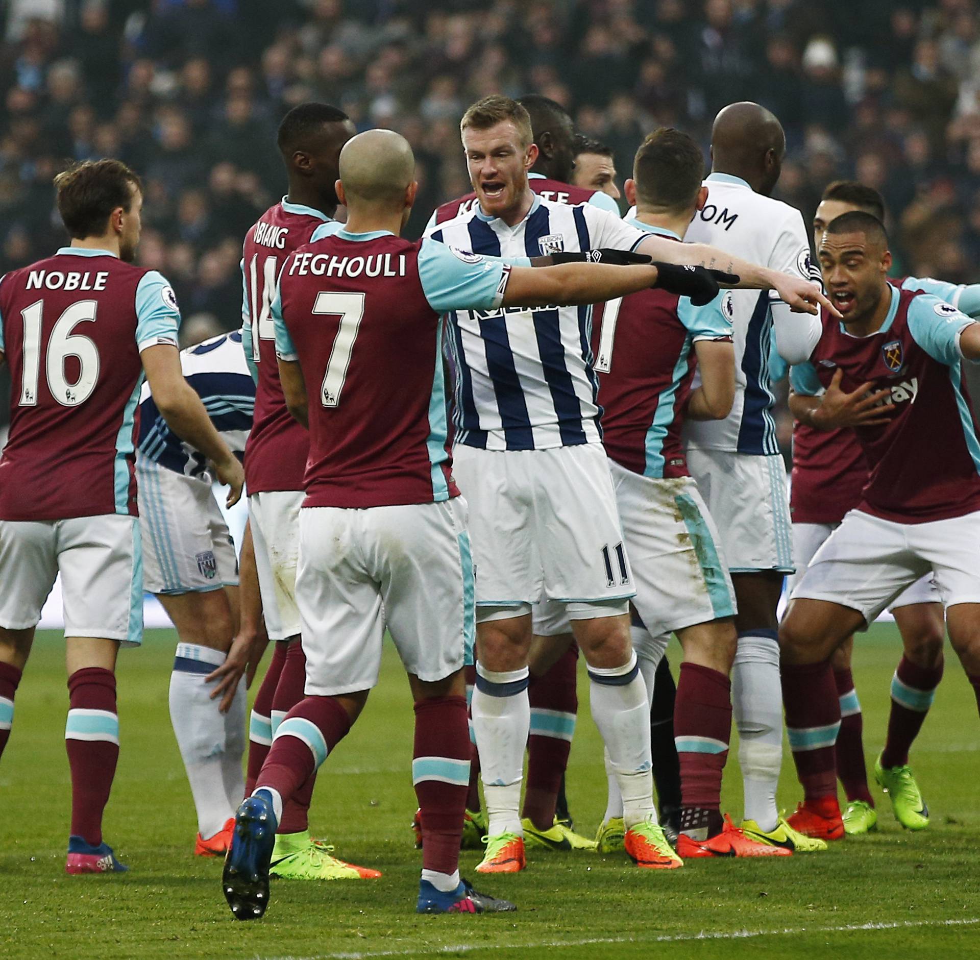 West Bromwich Albion's players and West Ham United's players appeal to referee Michael Oliver after West Ham United's Sofiane Feghouli scores a disallowed goal
