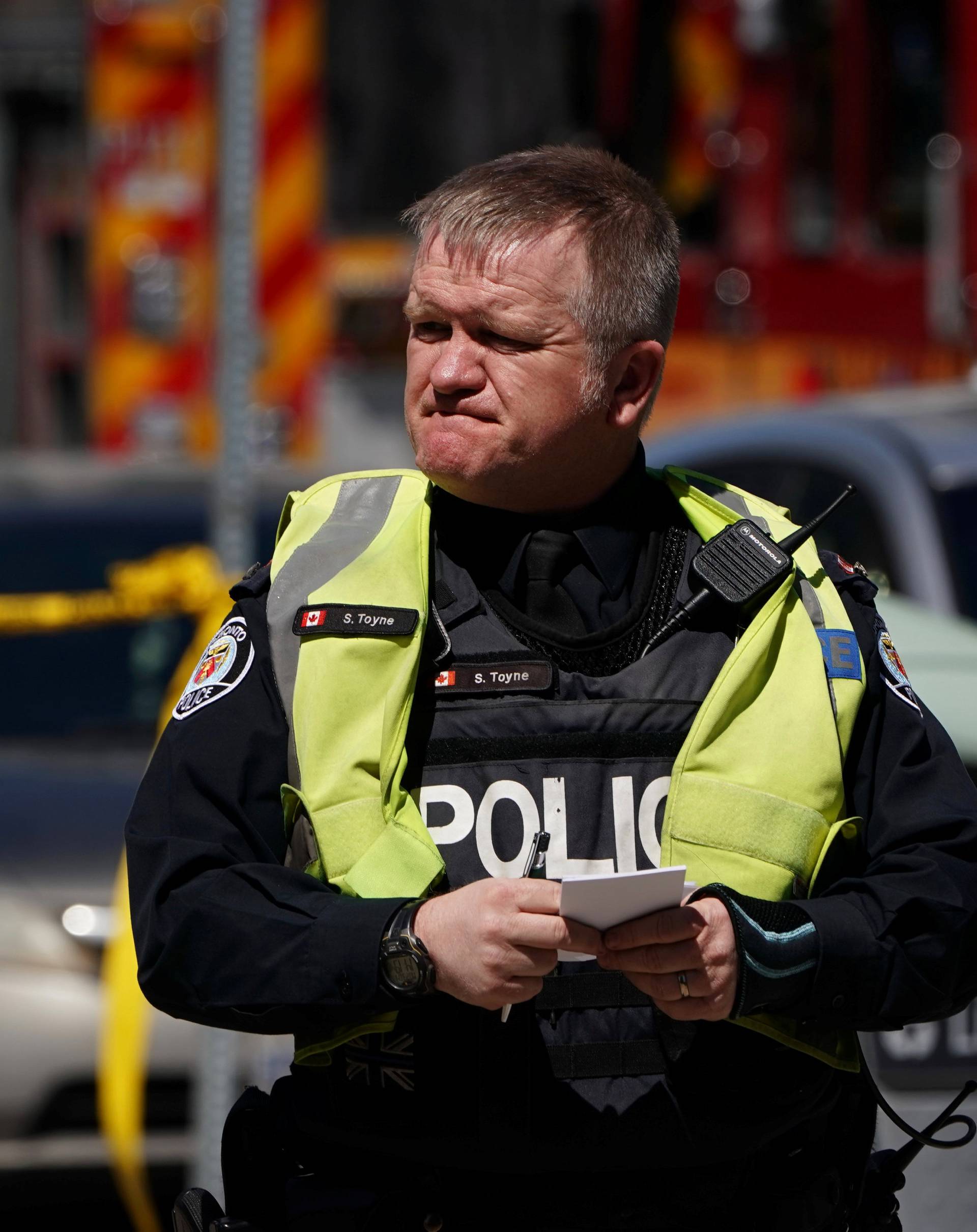 A pedestrian officer responds to an incident where van struck multiple people at a major intersection in Toronto's northern suburbs in Toronto