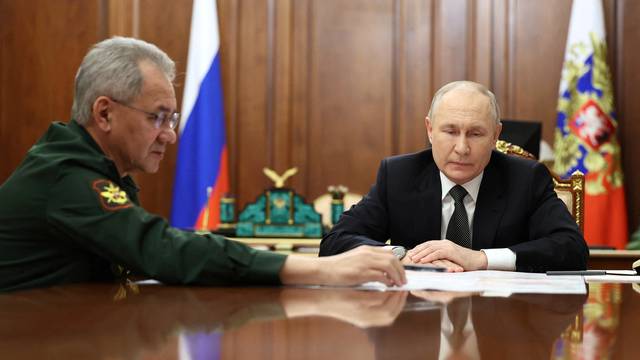 Russia's President Putin and Defence Minister Shoigu meet in Moscow