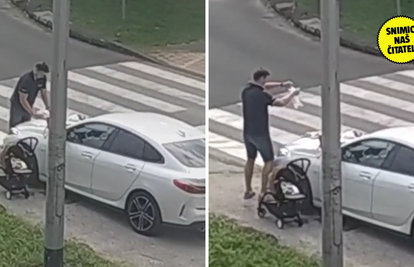 VIDEO Tata na zadatku: Presvukao bebu na haubi auta i raznježio prolaznike u Zagrebu