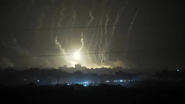 Airstrikes and explosions light up night over Gaza