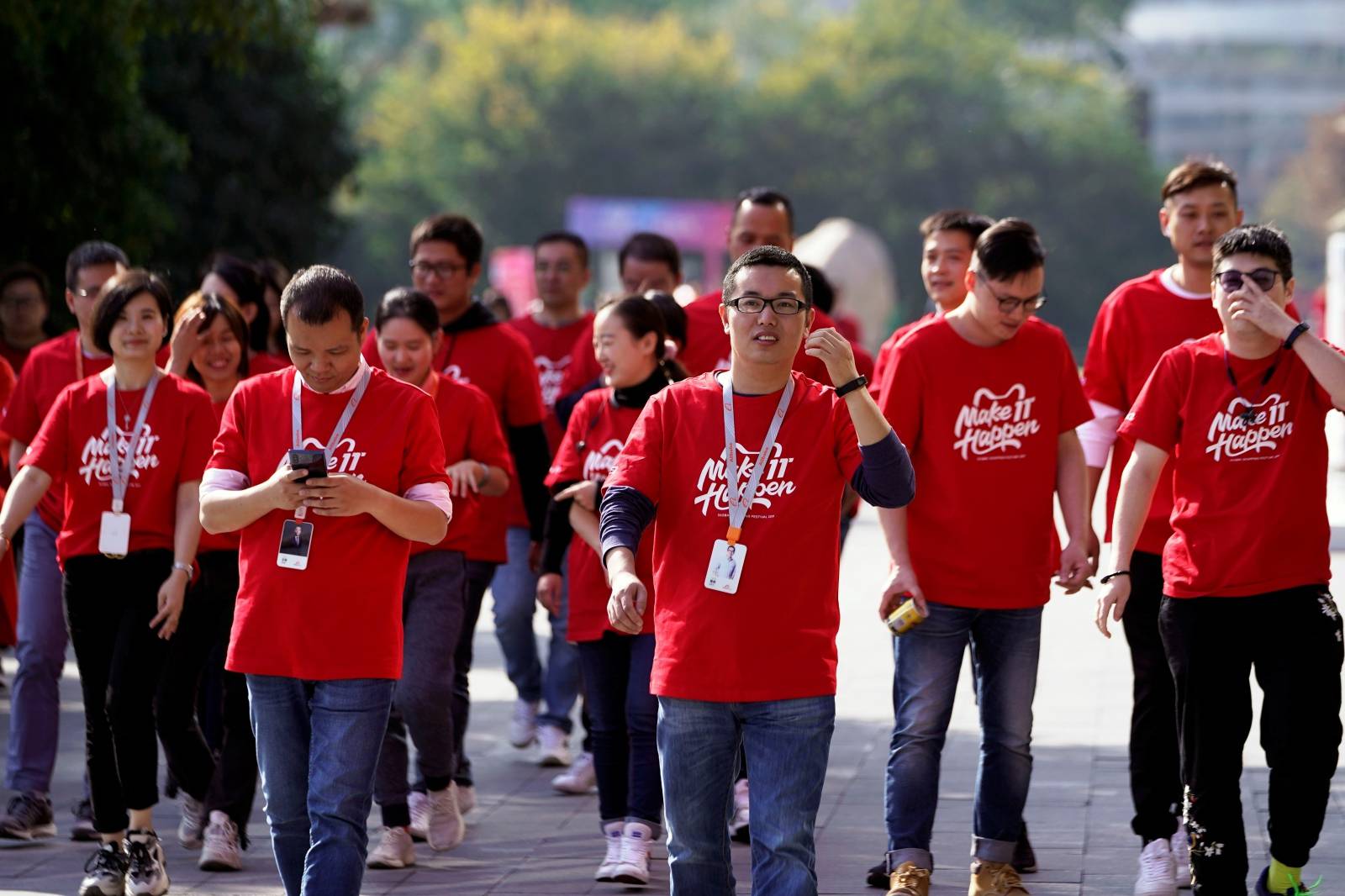 Employees of Alibaba walk during Alibaba Group's 11.11 Singles' Day global shopping festival at the company's headquarters in Hangzhou