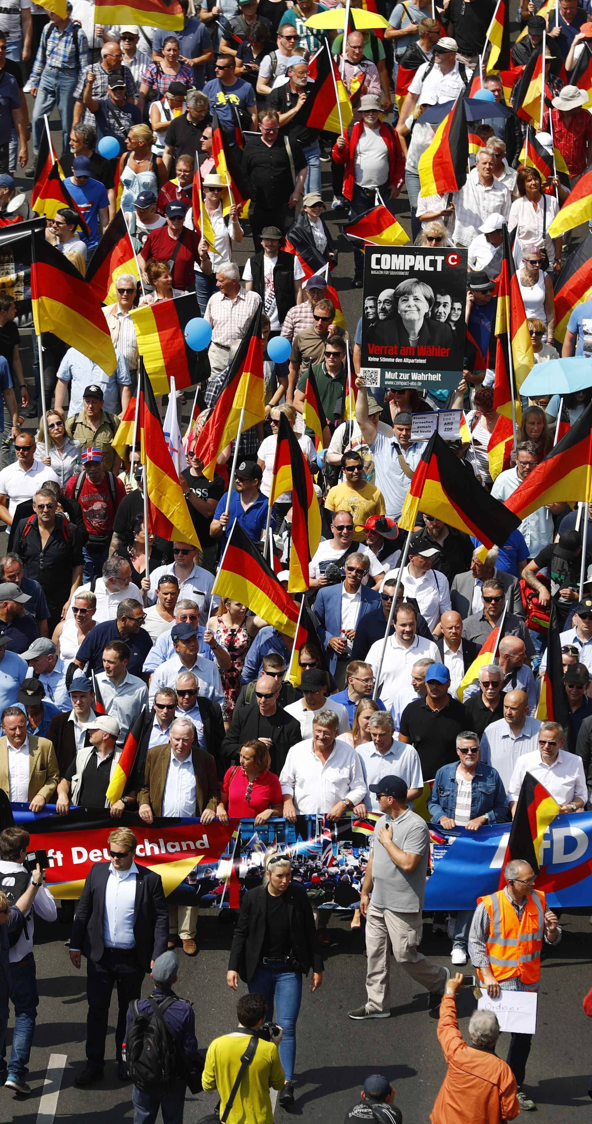 Supporters of the Anti-immigration party Alternative for Germany (AfD) hold a protest in Berlin