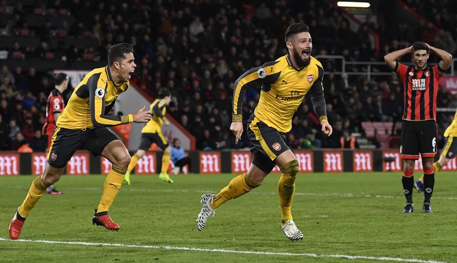 Arsenal's Olivier Giroud celebrates scoring their third goal