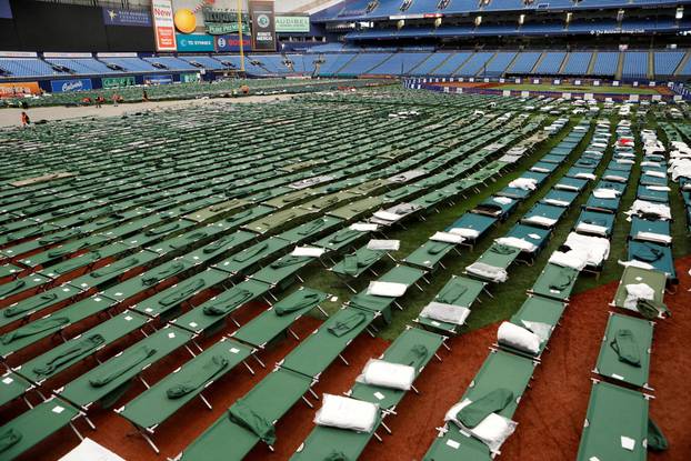 Tropicana Field opens a staging site for workers and operations before the arrival of Hurricane Milton, in St. Petersburg