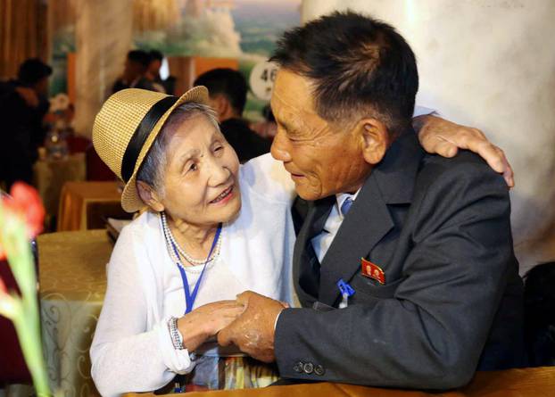 North and South Korean family members meet during a reunion at North Korea