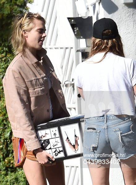*PREMIUM EXCLUSIVE NO WEB UNTIL 1800 BST 30TH MAY* Cara Delevingne and Ashley Benson buy a sexual bondage bed restraint while shopping together in Hollywood