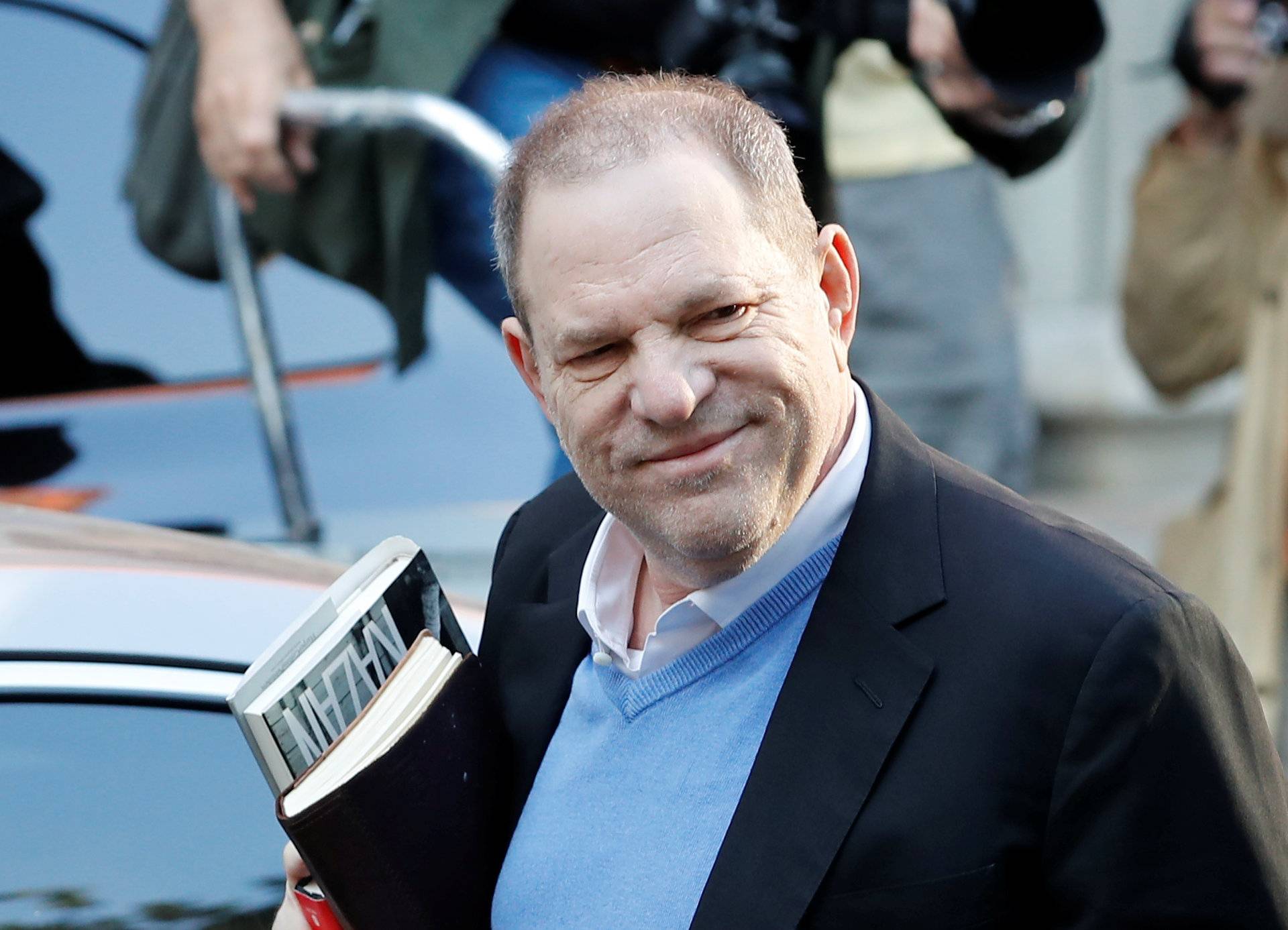 Film producer Harvey Weinstein arrives at the 1st Precinct in Manhattan in New York