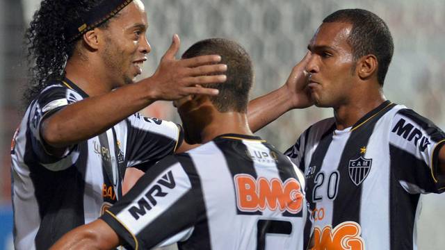 FILE PHOTO: Ronaldinho of Brazil's Atletico Mineiro celebrates scoring a goal against Bolivia's The Strongest with teammates during their Copa Libertadores soccer match in Belo Horizonte