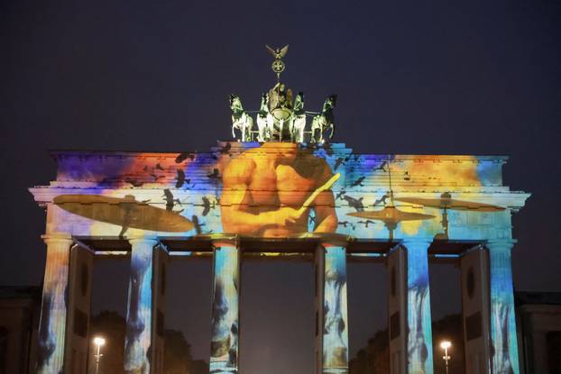 The Brandenburg Gate is illuminated during the Festival of Lights in Berlin