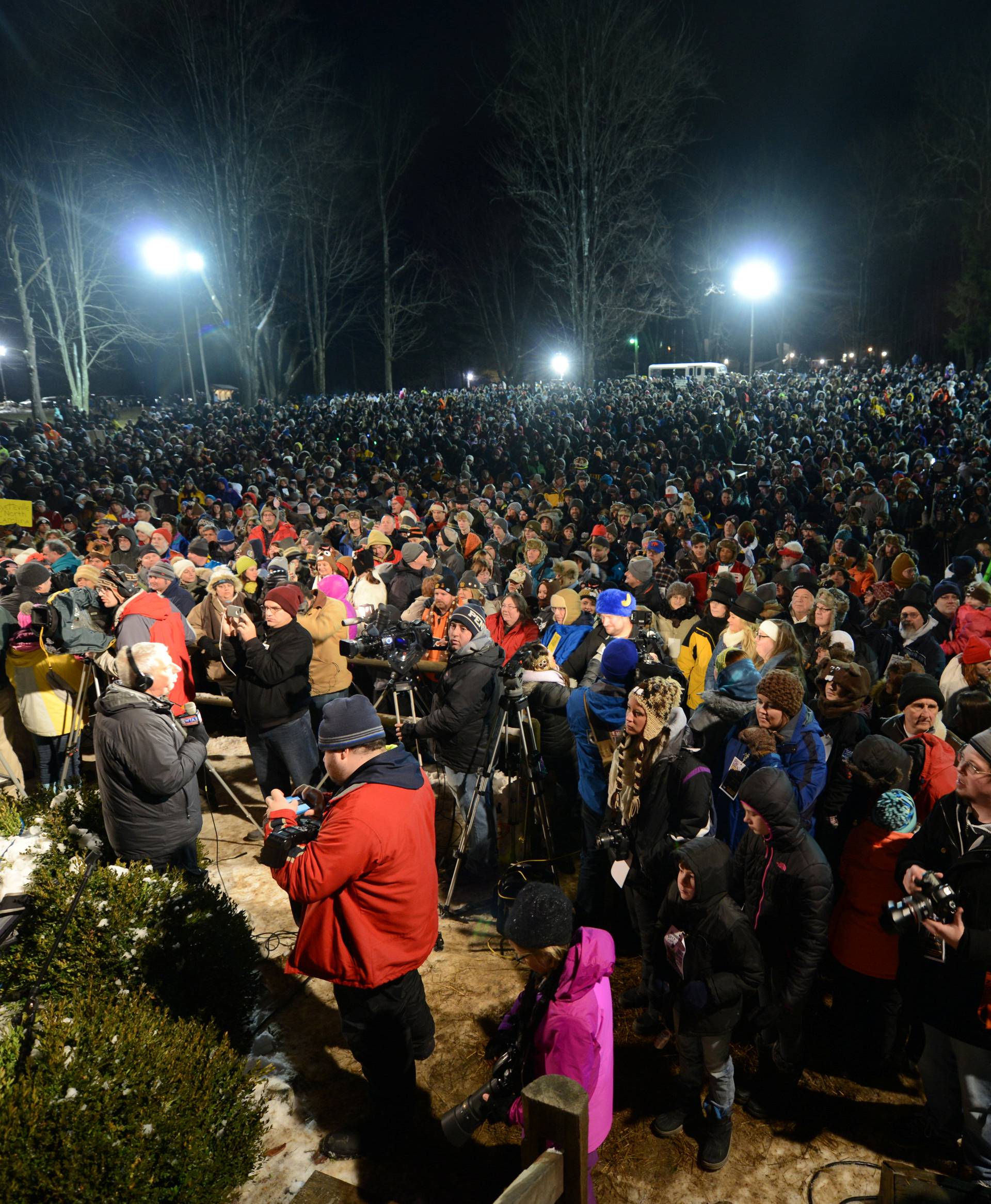 A crowd of people waits for Punxsutawney Phil on Groundhog Day in Punxsutawney